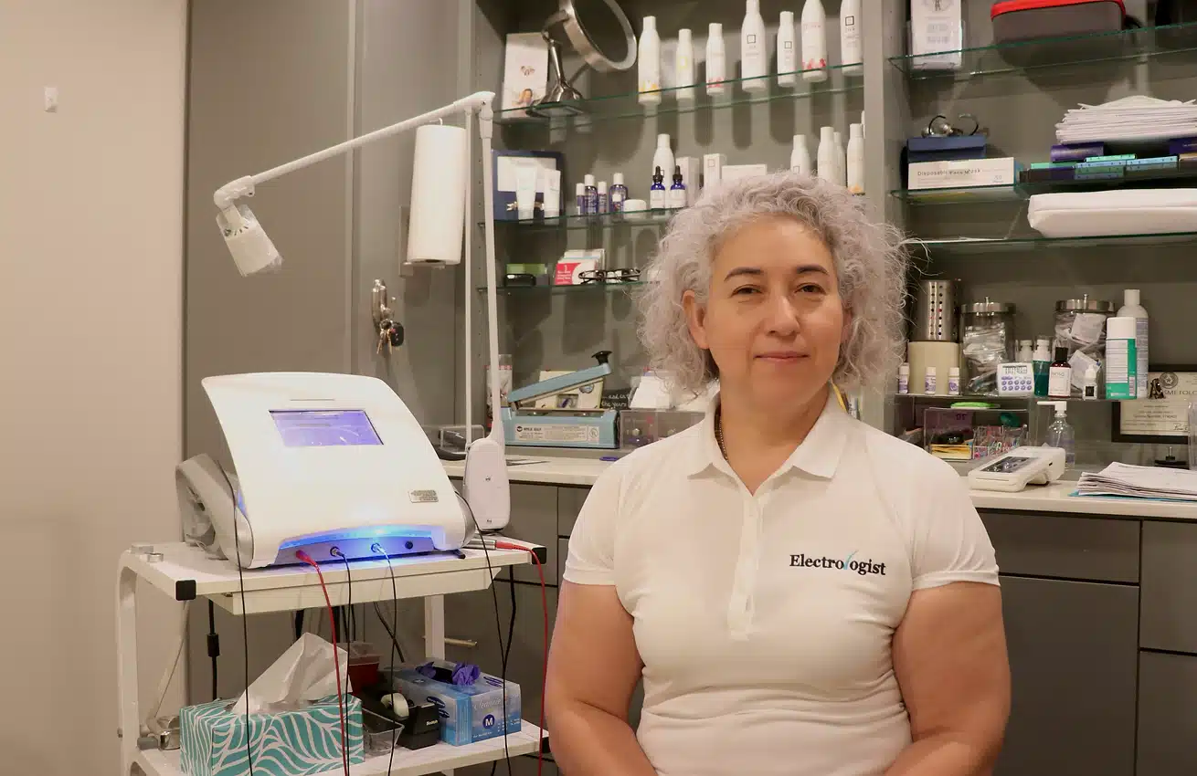 yolanda cueva near her electrolysis equipment